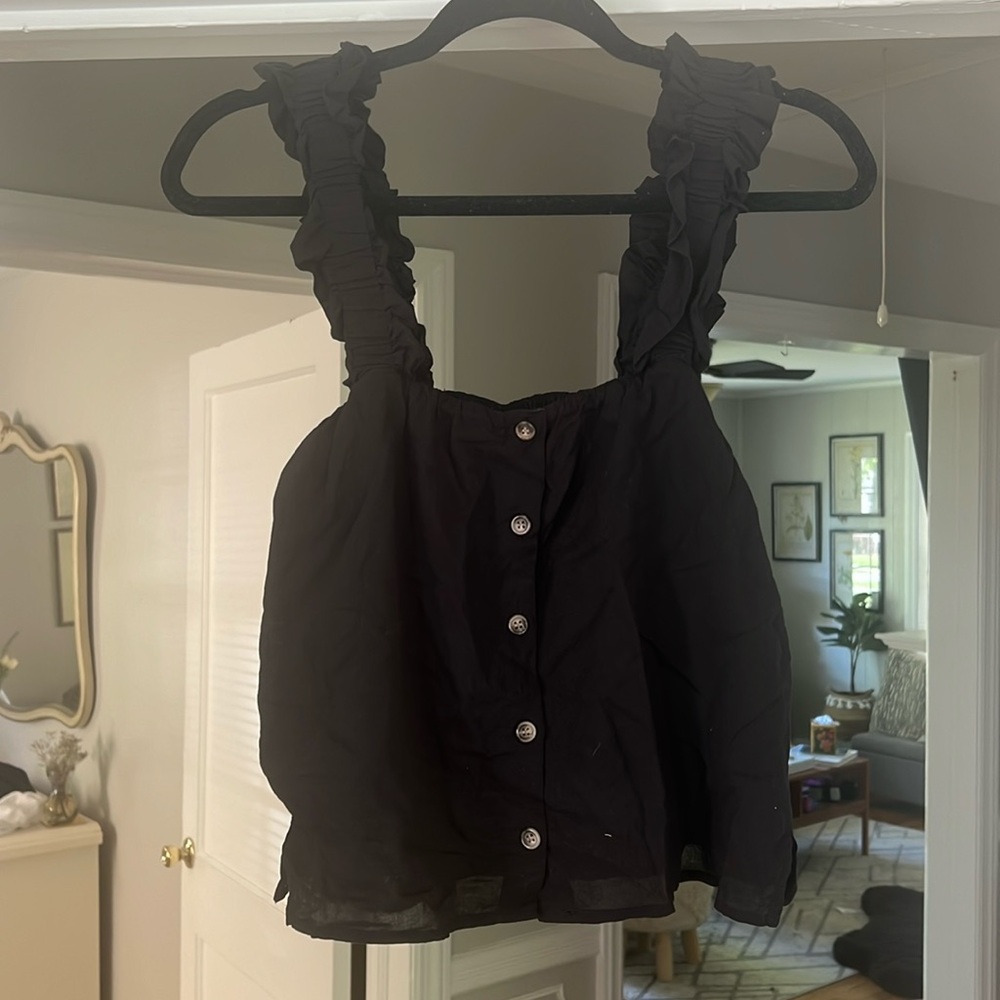 Cute black top w ruffle strap